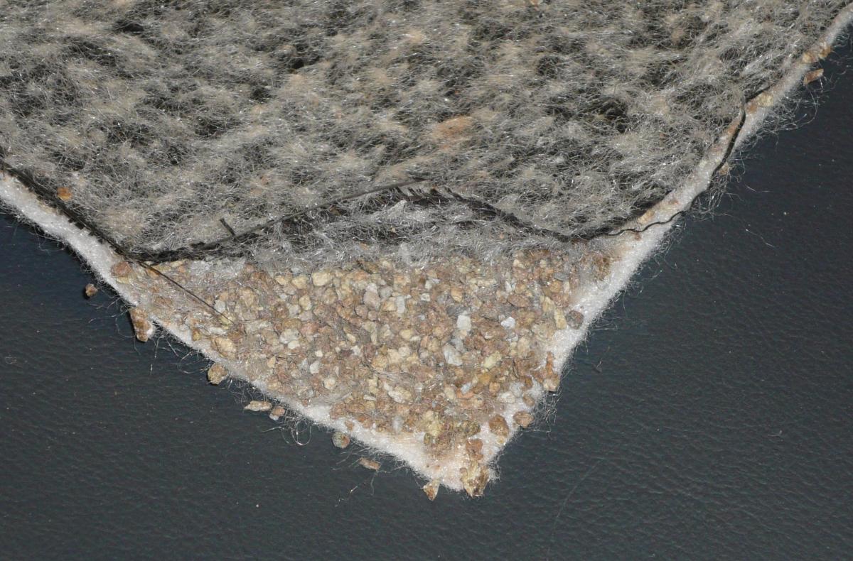 Geosynthetic clay liner, with fill of bentonite granules Geosynthetic clay liner, with fill of bentonite granules